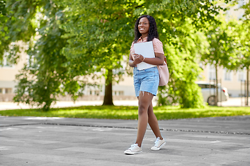 Image showing african student girl with notebooks in city