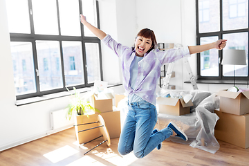 Image showing happy asian woman with stuff moving to new home