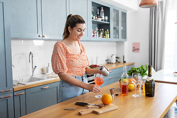 Image showing woman making cocktail drinks at home kitchen