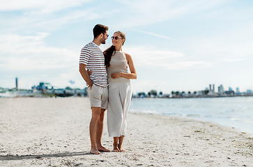 Image showing happy couple on summer beach