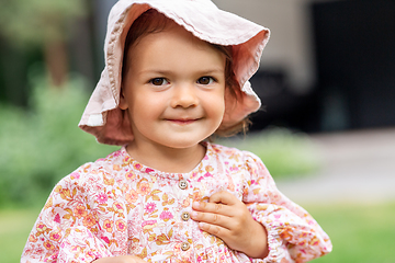 Image showing happy little baby girl outdoors in summer