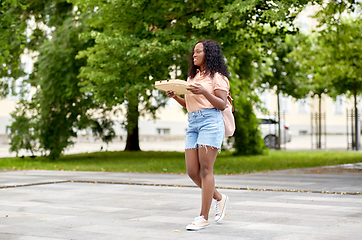 Image showing african student girl with takeaway pizza in city