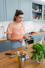 Image showing woman making cocktail drinks at home kitchen