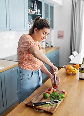 Image showing woman making cocktail drinks at home kitchen