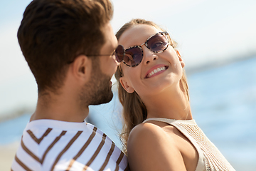 Image showing portrait of happy couple on summer beach