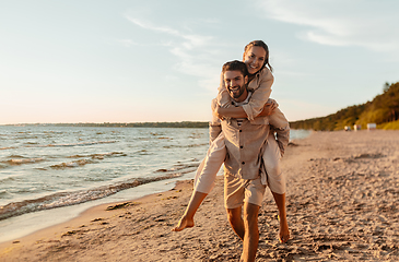 Image showing happy couple having fun on summer beach