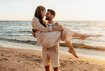 Image showing happy couple having fun on summer beach