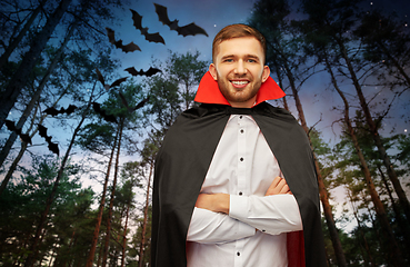 Image showing happy man in halloween costume of vampire