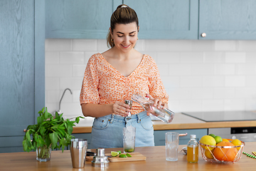 Image showing woman making cocktail drinks at home kitchen