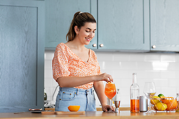 Image showing woman making cocktail drinks at home kitchen