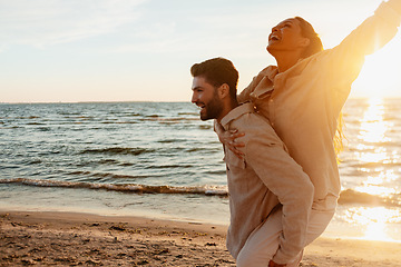 Image showing happy couple having fun on summer beach