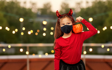 Image showing girl in halloween costume and mask