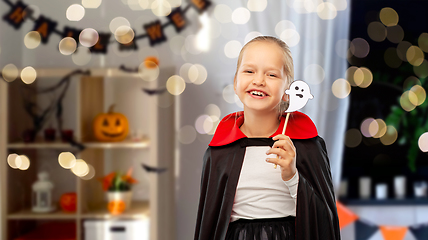 Image showing girl in costume of dracula with cape on halloween