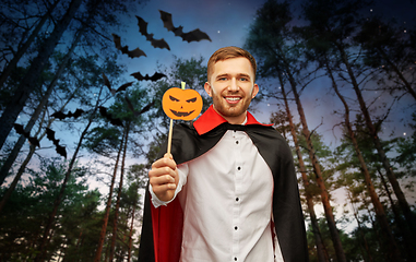 Image showing happy man in halloween costume of vampire