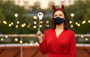 Image showing woman in halloween costume of devil and black mask