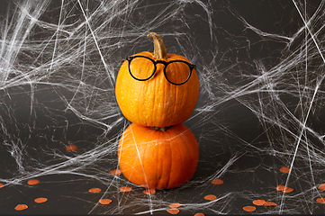 Image showing halloween pumpkins with glasses and spiderweb