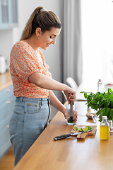 Image showing woman making cocktail drinks at home kitchen