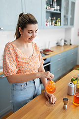 Image showing woman making cocktail drinks at home kitchen