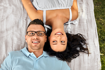 Image showing happy couple on picnic blanket