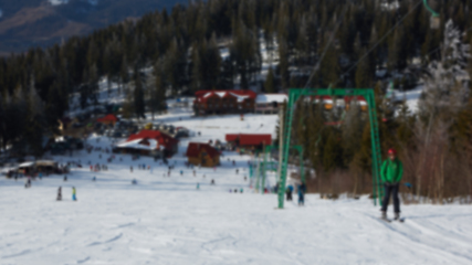 Image showing Blur panoramic view of sport resort for winter vacation. Skies with back light. Warm filter with original sun color tones