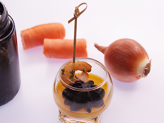 Image showing Appetizer in a glass. Shrimp with vegetable puree with cuttlefish ink. Healthy food. Top view