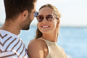 Image showing portrait of happy couple on summer beach