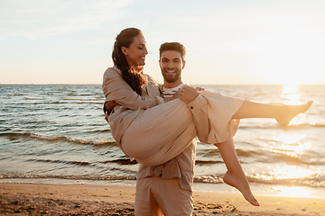 Image showing happy couple having fun on summer beach