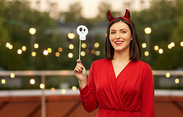 Image showing happy woman in red halloween costume of devil