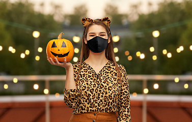 Image showing woman in black mask and halloween costume