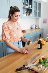 Image showing woman making cocktail drinks at home kitchen