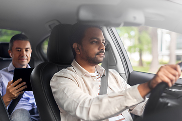 Image showing indian male driver driving car with passenger