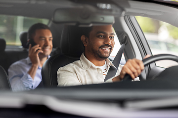 Image showing indian male driver driving car with passenger