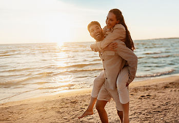 Image showing happy couple having fun on summer beach