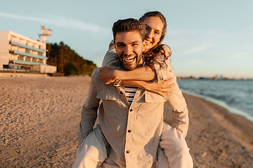 Image showing happy couple having fun on summer beach