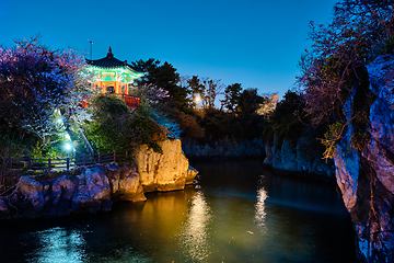 Image showing Yongyeon Pond with Yongyeon Pavilion illuminated at night, Jeju islands, South Korea