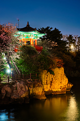 Image showing Yongyeon Pond with Yongyeon Pavilion illuminated at night, Jeju islands, South Korea