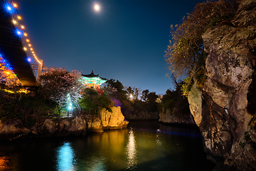 Image showing Yongyeon Pond with Yongyeon Pavilion illuminated at night, Jeju islands, South Korea