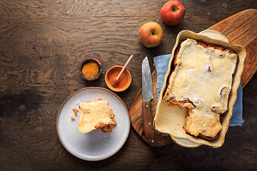 Image showing Homemade bread pudding breakfast casserole with apples and cinnamon