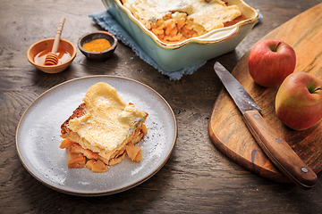 Image showing Homemade bread pudding breakfast casserole with apples and cinnamon