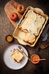 Image showing Homemade bread pudding breakfast casserole with apples and cinnamon