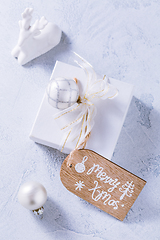 Image showing Christmas gift with ornaments in white.