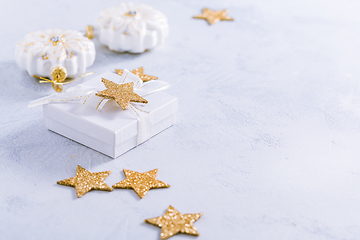 Image showing Christmas gift with ornaments in white. 