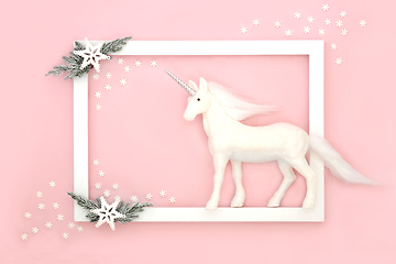 Image showing Christmas Magic Background with Unicorn Snowflakes and Fir