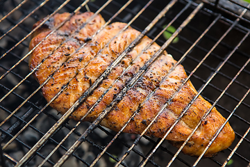 Image showing Fish char-grilled over flame