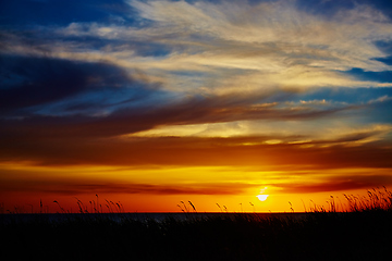 Image showing Sunset over the ocean