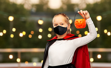 Image showing girl in mask and costume of dracula on halloween