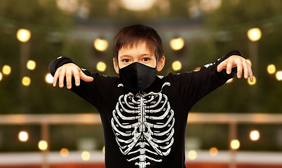 Image showing boy in mask and halloween costume of skeleton