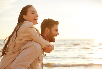 Image showing happy couple having fun on summer beach