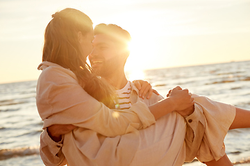 Image showing happy couple having fun on summer beach