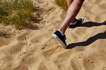 Image showing Close up fashion image of man walking alone 